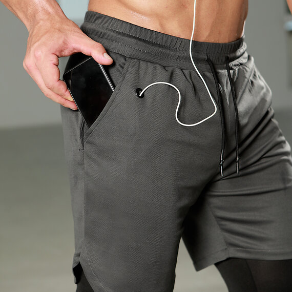 Men's 2 in 1 grey shorts and black yoga legging,fashion design - towel loop,Drawstring closure,Elastic Waist band, Headphone Jack,zipper pocket.